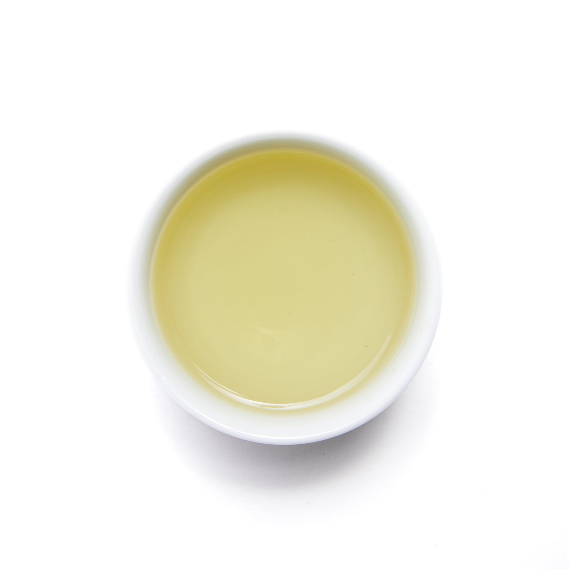 Spring Green Tea - Loose Leaf by Wild Orchard Tea, image of brewed tea in a cup