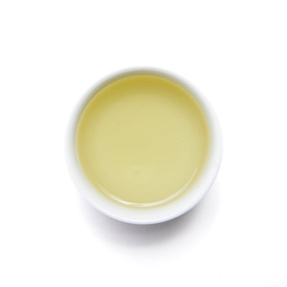 Spring Green Tea - Loose Leaf by Wild Orchard Tea, image of brewed tea in a cup